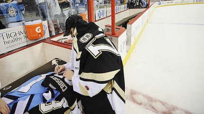 In his first game back after missing four games with a sore left groin, Sidney Crosby scores against Panthers goalie Tomas Vokoun in the second period