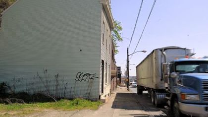 Traffic whizzes by 1208 E. Ohio St., the former home of Helen Kusar.