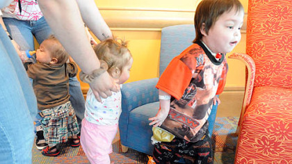 Transplant patient Oliver Wilhelm III, right, 5, of Kingwood, W.Va., explores the new environment at the Children's Hospital in Lawrenceville yesterday with his playmates, 21-month-old Bentley Brands of Tyler, Texas, left, and 13-month-old Abigail Dovolos of Buffalo, N.Y.