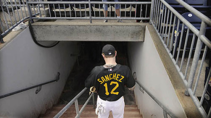 Sanchez signs autographs before last night's game.