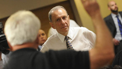 Sen. Arlen Specter fields a question from John Phillips of North Apollo during his town hall meeting in Kittanning,  Mr. Phillips said that Washington, D.C., has lost touch with the American people.