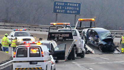 Cars are removed from the inbound Parkway East just past Rodi Road. A man was killed and two people were injured when the man entered the Parkway going in the wrong direction.