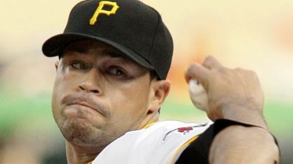 Ian Snell works against the New York Mets in the first inning last night. Snell gave up five runs in six innings, but the Pirates rallied for an 8-5 victory.