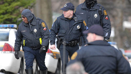 City of Pittsburgh police surrounded the scene where a man involved in a domestic dispute in the 1000 block of Fairfield St., Stanton Heights, Pittsburgh, opened fire on police, killing three and injuring as many as two others.