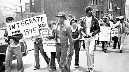 In a 1975 march supporting integration in the public schools nationwide, about 70 participants walked from Crawford Street and Centre Avenue, Uptown, through the Hill District into Oakland and ended at Flagstaff Hill. The march was sponsored by the Pittsburgh chapter of the NAACP.