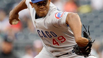 Cubs closer Carlos Marmol throws in the ninth inning.