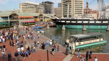 A water taxi docks at Baltimore's Inner Harbor, a popular tourist destination in the city.