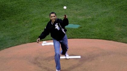 President Barack Obama throws out the first pitch.