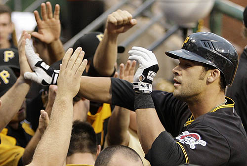 Pirates outfielder Garrett Jones right celebrates with teammates in the