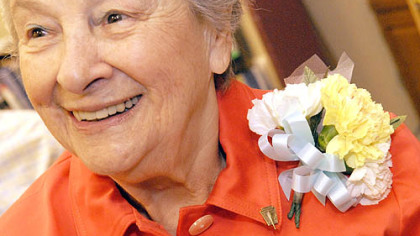 After 76 years, Gertrude Frishman Brog, 93, a graduate of Fifth Avenue High School in 1933, finally receives her National Honor Society pin.