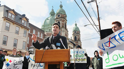 Pittsburgh Councilman Patrick Dowd announces his bid to enter the race for mayor at a news conference yesterday in Polish Hill. The Democratic primary is on May 19.
