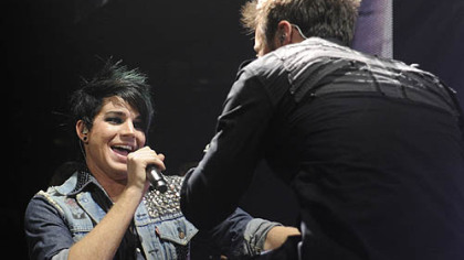 Adam Lambert, left, and Kris Allen sing during the American Idols concert.