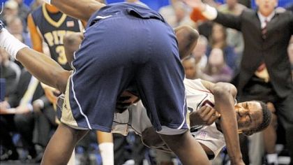 DeJuan Blair flips Connecticut center Hasheem Thabeet over his back as they fight for a rebound in the first half Feb. 16 in Hartford, Conn. Thabeet was called for a foul on the play and was held to five points and four rebounds in the game. Blair could not be stopped, scoring 22 and grabbing 23 rebounds.