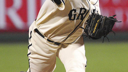Pirates pitcher Matt Capps pitches to Royals third baseman Mark Teahen in the ninth inning.