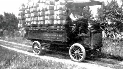 Stephen Affolder, at the wheel of the family farm truck, heads to market on the North Side in the early 20th century.