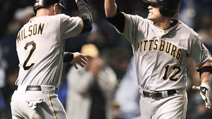 Freddy Sanchez right, celebrates with teammate Jack Wilson after hitting a two-run home against the Chicago Cubs in May.