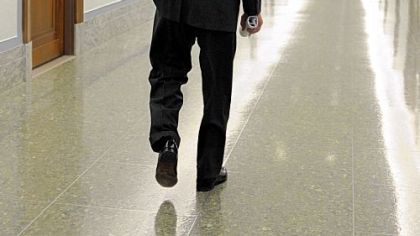 Sen. Arlen Specter, D-Pa., walks down the hall of the Dirksen Senate Office Building after an appropriations hearing on Thursday.