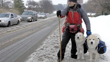 Luke Robinson of Austin, Texas, on a snow-covered road this winter as he walked from Austin toward Boston.