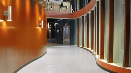 A corridor on the "Three Rivers" set evokes the flow of a river in its bed.