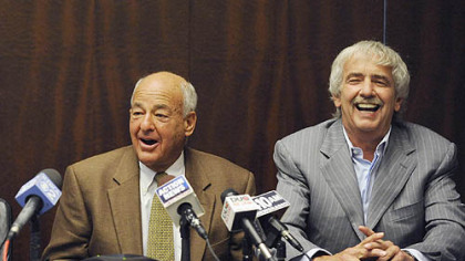 His criminal charges dismissed, former Allegheny County Coroner Dr. Cyril H. Wecht, with attorney Jerry McDevitt by his side, is able to laugh during a news conference last week.