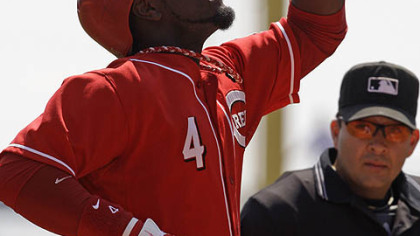 Reds second baseman Brandon Phillips celebrates after hitting a solo home run off Pirates pitcher Zach Duke in the fourth inning.
