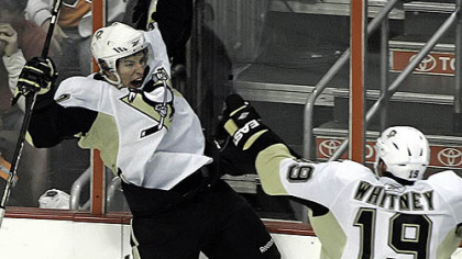 Sidney Crosby celebrates his go-ahead goal late in yesterday's game in Philadelphia. It capped a four-point game for him and helped resurrect some momentum for the team heading to Washington.