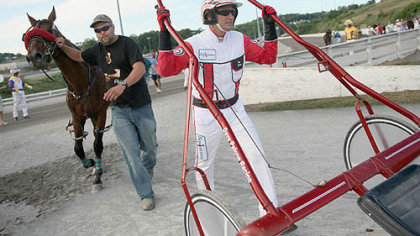 Palone has more than $60 million in career winnings. That doesn't prevent him from pushing his own sulky back to the stables.
Bob Donaldson/Post-Gazette