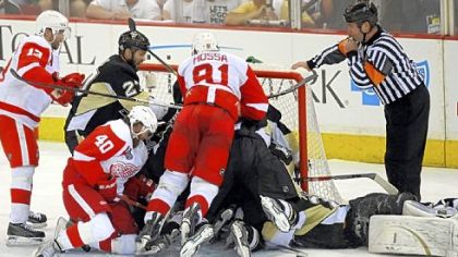 The Red Wings swarmed Marc-Andre Fleury late, including this pileup in the crease, but they could not score the tying goal.