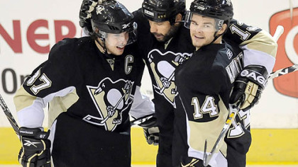 Sidney Crosby and Chris Kunitz congratulate Bill Guerin on his first-period goal against the Capitals in Game 6 of the Eastern Conference semifinals Monday night at the Mellon Arean.