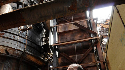 Allegheny County Executive Dan Onorato goes through the remnants of the Carrie Furnace site.