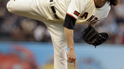 Giants starter Tim Lincecum delivers a pitch against the Pirates in the sixth inning.