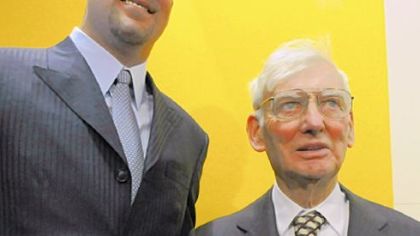 Quarterback Ben Roethlisberger smiles with Dan Rooney last March after signing a new $102 million contract.