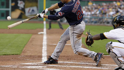 Indians outfielder Grady Sizemore connects on a third-inning pitch from Ian Snell for a two-run triple last night.