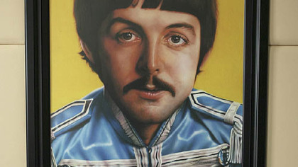 A portrait of Paul McCartney hangs on the wall of a suite at the newly opened Hard Days Night Hotel, Friday, Feb. 1, 2008, in Liverpool, England. Visitors to Liverpool, birthplace of the Beatles, can rest their heads in the Lennon or McCartney suites at the Hard Days Night Hotel, a Fab Four-themed hostelry that opened Friday. More than 45 years after John, Paul, George and Ringo emerged from Liverpool's tiny, sweaty clubs to conquer the world, the Beatles industry is key to this battered-but-proud city's attempt to transform itself from fading commercial hub to thriving cultural hotbed. The 110-room Hard Days Night Hotel hopes to be its newest attraction.