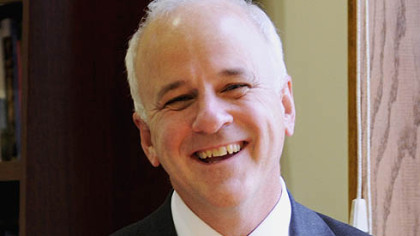 St. Vincent College President Jim Towey in his office at the college yesterday.