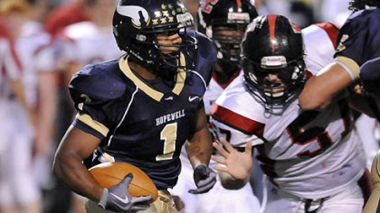 Hopewell's Rushel Shell carries against New Castle in the first half last night.