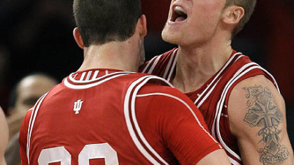 Indiana forward Derek Elston, right, celebrates with forward Bobby Capobianco after Indiana took a 17 point lead in the second half against Pitt last night.