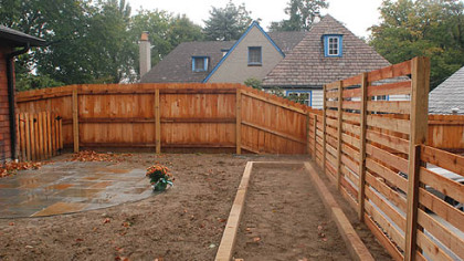 The Pennsylvania Bluestone patio is off the kitchen.  The rectangular area will be planted with a rain garden that includes such drought-resistant plants as trumpet vines, phlox, flume flower and high grass.