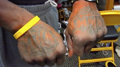 Steelers receiver Santonio Holmes knows his history: "Muck City," the nickname for Belle Glade, Fla., where he grew up, is tattooed on his hands.