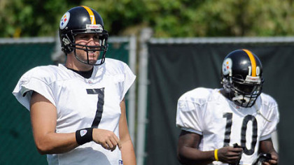 Preparation for Sunday's game in Chicago continued on the South Side yesterday for Ben Roethlisberger, left, and Santonio Holmes.