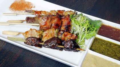 Skewers of beef, chicken, shrimp and shitake mushrooms cooked on the robata grill and served with ponzu butter, ginger and chimichurri dipping sauces.