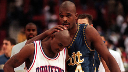 Pitt forward Gerald Jordan talks to Duquesne guard Mike James following the 1996 City Game at the Civic Arena. Pitt won, 75-73.