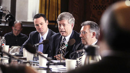 Pittsburgh Mayor Luke Ravenstahl; University of Pittsburgh President Mark Nordenberg; and Robert Morris University President Dr. Gregory G. Dell'Omo gather in city council chambers to discuss the proposed tuition tax.