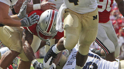 Navy quarterback Ricky Dobbs has passed for 259 yards and run for 130 more in the  Midshipmen's first two games.