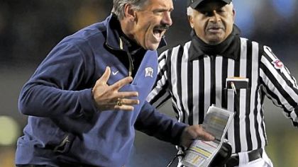 Pitt coach Dave Wannstedt looks for a holding call against West Virginia in the first quarter last night at Mountaineer Field in Morgantown, W.Va.