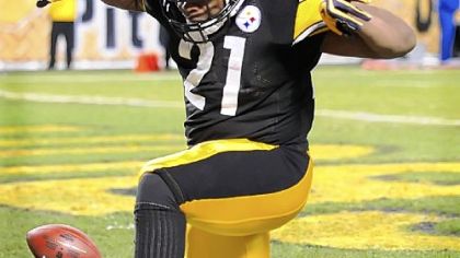 Mewelde Moore celebrates his touchdown in the second quarter.