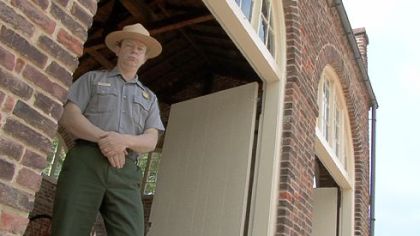 Park historian Dennis Frye at the fire house that became the scene of John Brown's last stand in Harpers Ferry 150 years ago.