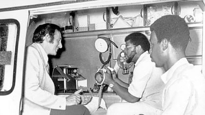 From left to right: Dr. Sidney Heller, Eugene Key, crew chief, and EMT Harold Brown of Freedom House