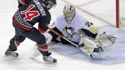 Marc-Andre Fleury denies Carolina's Sergei Samsonov during the shootout between the Penguins and Hurricanes Wednesday night.