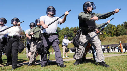 Several Allegheny County sheriff's deputies brush up on their crowd-control techniques at the Allegheny County Police Academy in North Park yesterday in preparation for the two-day G-20 summit, which begins Thursday.